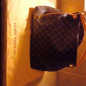 Louis Vuitton signature print and braided shoulder strap, handle